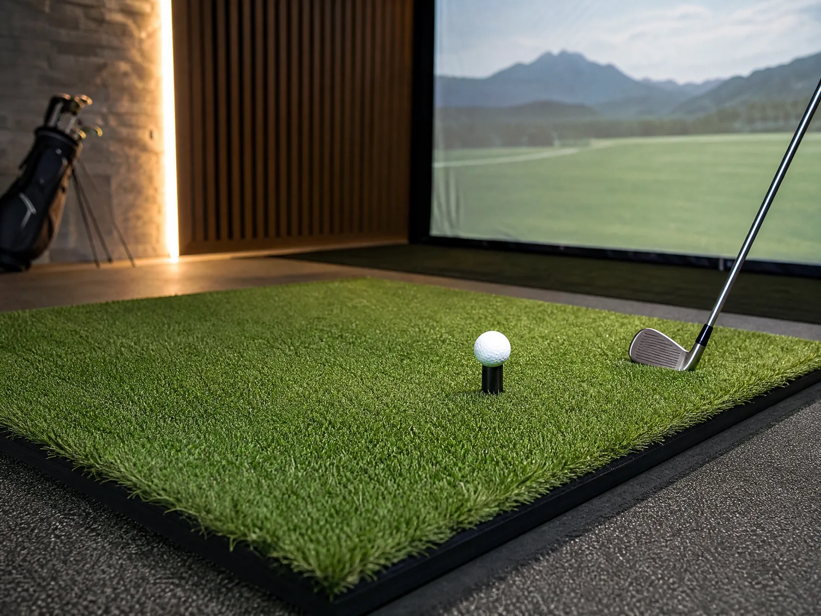 A professional backyard putting green featuring smooth green turf and a practice hole cup.